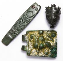 Anglo-Saxon & Medieval artefact group including a 8th - 9th century strap end, a Medieval buckle