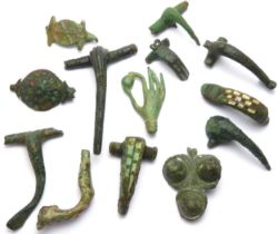 Roman Artefact Group (13). Circa 1st-3rd century CE. Copper-alloy, largest 57mm.Â To include
