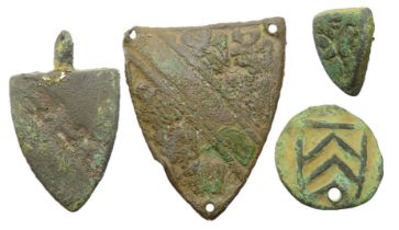 Medieval Heraldic Group (4). Circa 13th-14th century CE. Largest 41mm. To include, a shield-shaped