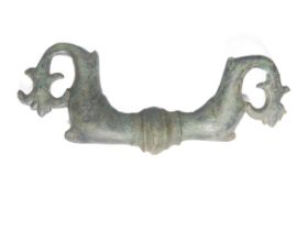 Roman Zoomorphic Handle. Circa 2nd century AD.Â  Copper-alloy, 55.54g. 107mm. A casket drop handle