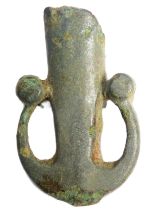 Iron age scabbard chape. A copper alloy anchor-shaped chape from a sword or dagger scabbard,