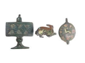 Roman Artifacts (3). Circa 2nd-3rd century AD. To include a pendant, a brooch in the form of a