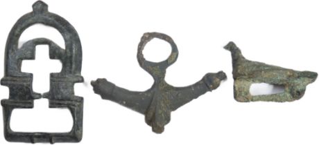 Roman Artefacts (3). Circa 2nd-4th century AD. To include a buckle with integral plate, a military