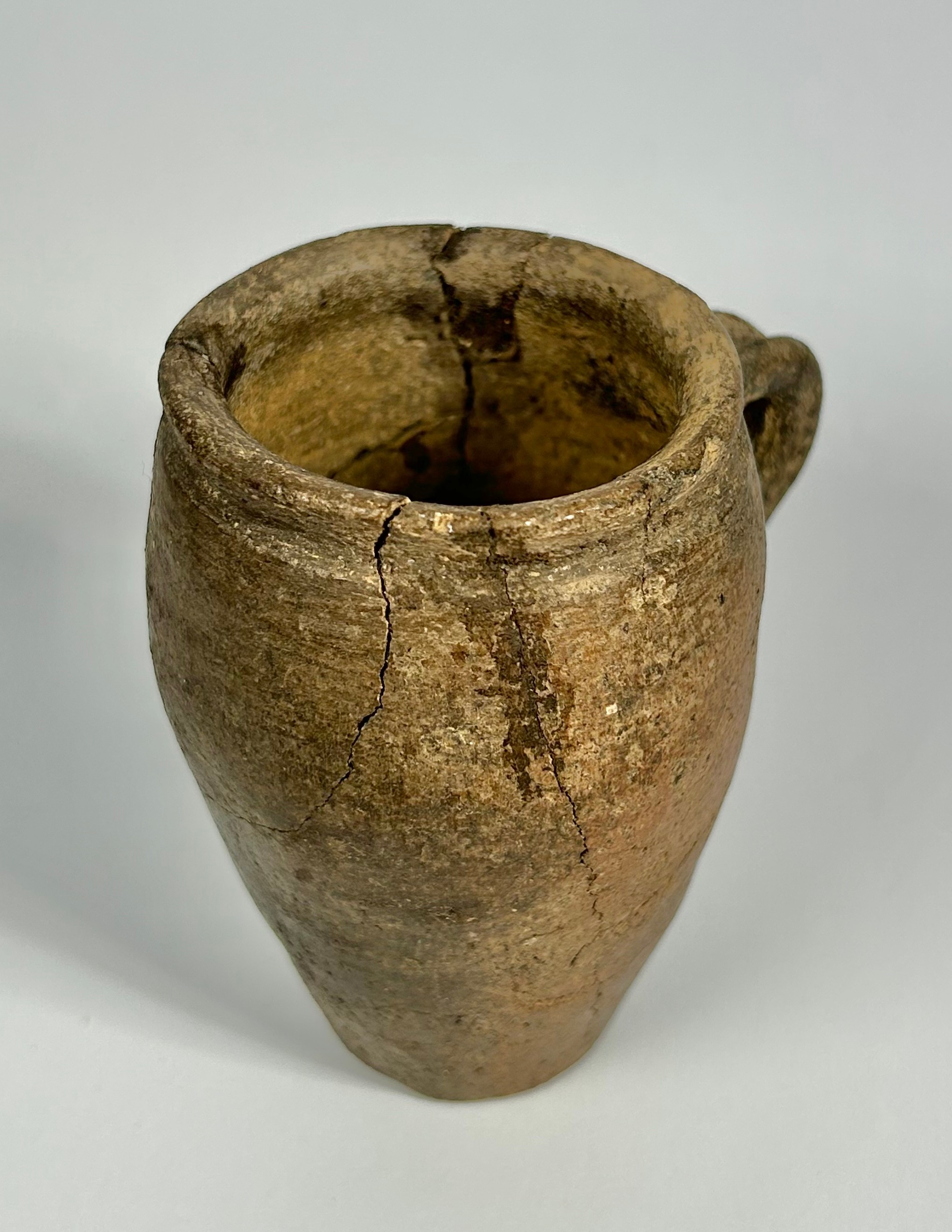 14th Century medieval pottery cup. 98mm x 55mm. A barrel-shaped vessel with a flat base and small - Image 2 of 3