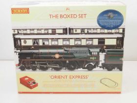 A HORNBY R1038 'Orient Express' premium boxed set comprising a Merchant Navy Class steam