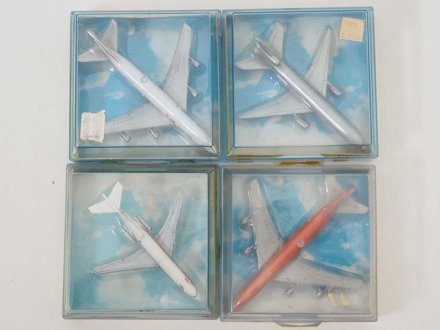A group of CORGI (Lintoys) diecast commercial aircraft comprising: a Douglas DC10 in American