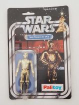 A PALITOY STAR WARS See-Threepio (C-3PO) figure on original 12 back card (SW-12B) from the first
