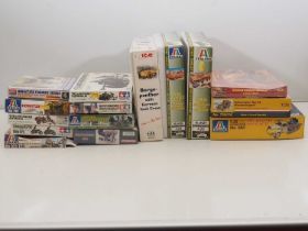 A group of unbuilt plastic military vehicle and figure kits in various scales by ITALERI, TAMIYA,