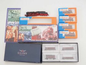 A ROCO HO gauge 43145 goods train pack comprising steam loco and 4 wagons together with a LILIPUT