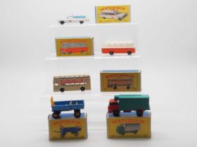 A group of MATCHBOX 1-75 series regular wheels diecast vans and buses in Type E3 and E4 boxes - VG