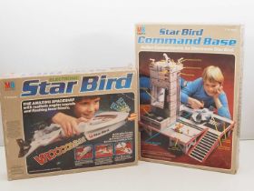 A MILTON BRADLEY (MB GAMES) vintage 1979 Star Bird electronic space ship together with the Star Bird