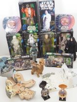 A group of modern STAR WARS 12" figures in original boxes by HASBRO and others together with various