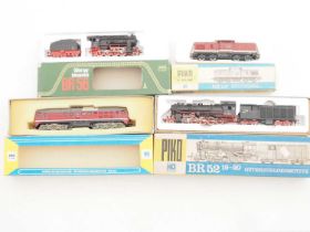 A group of PIKO HO gauge German Outline vintage diesel and steam locomotives - G in F/G boxes (4)