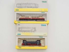 A pair of TRIX HO gauge German Outline model railway items comprising a V120 diesel loco and a VT859