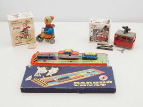 A group of Eastern European tinplate clockwork toys comprising: a vintage Hungarian train shunting