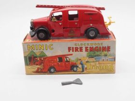 A TRIANG MINIC 62M post war tinplate clockwork fire engine - G/VG in G box