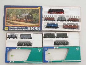 A PIKO HO gauge German Outline Goods Train set comprising steam loco and goods wagons together