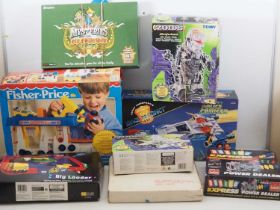 A large removals box full of mixed games including TOMY ZOIDS, FISHER PRICE etc - G/VG in F/G