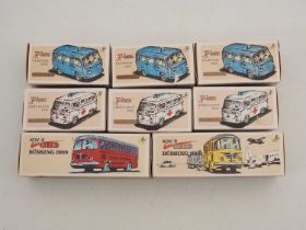 A group of Czech Republic produced retro style tinplate VW vans and buses by KOVAP all in