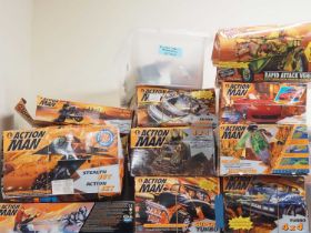 A very large group of 1990s issue ACTION MAN vehicles and accessory sets in original boxes / backing
