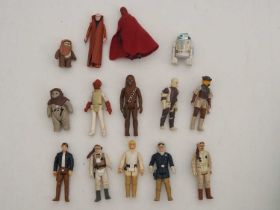 A group of vintage STAR WARS KENNER 1970s/early 80s figures as lotted - to include R2D2, an Ewok etc