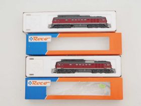 A pair of ROCO HO gauge German Outline diesel locomotives comprising Classes BR142 and BR232 both in