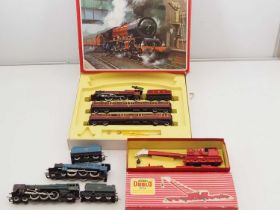 A mixed group of OO gauge rolling stock comprising two unboxed steam locomotives by LIMA and HORNBY,