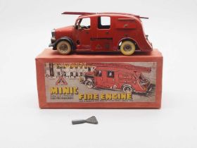 A TRIANG MINIC 62ME pre-war tinplate clockwork fire engine fitted with battery operated headlights -