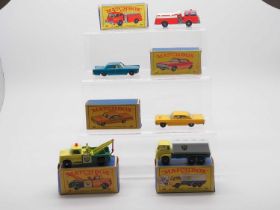 A group of MATCHBOX 1-75 series regular wheels diecast cars and lorries in Type E1 and E2 boxes - VG