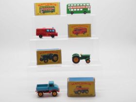 A group of MATCHBOX 1-75 series regular wheels diecast vans together with a bus in Type E3 and E4