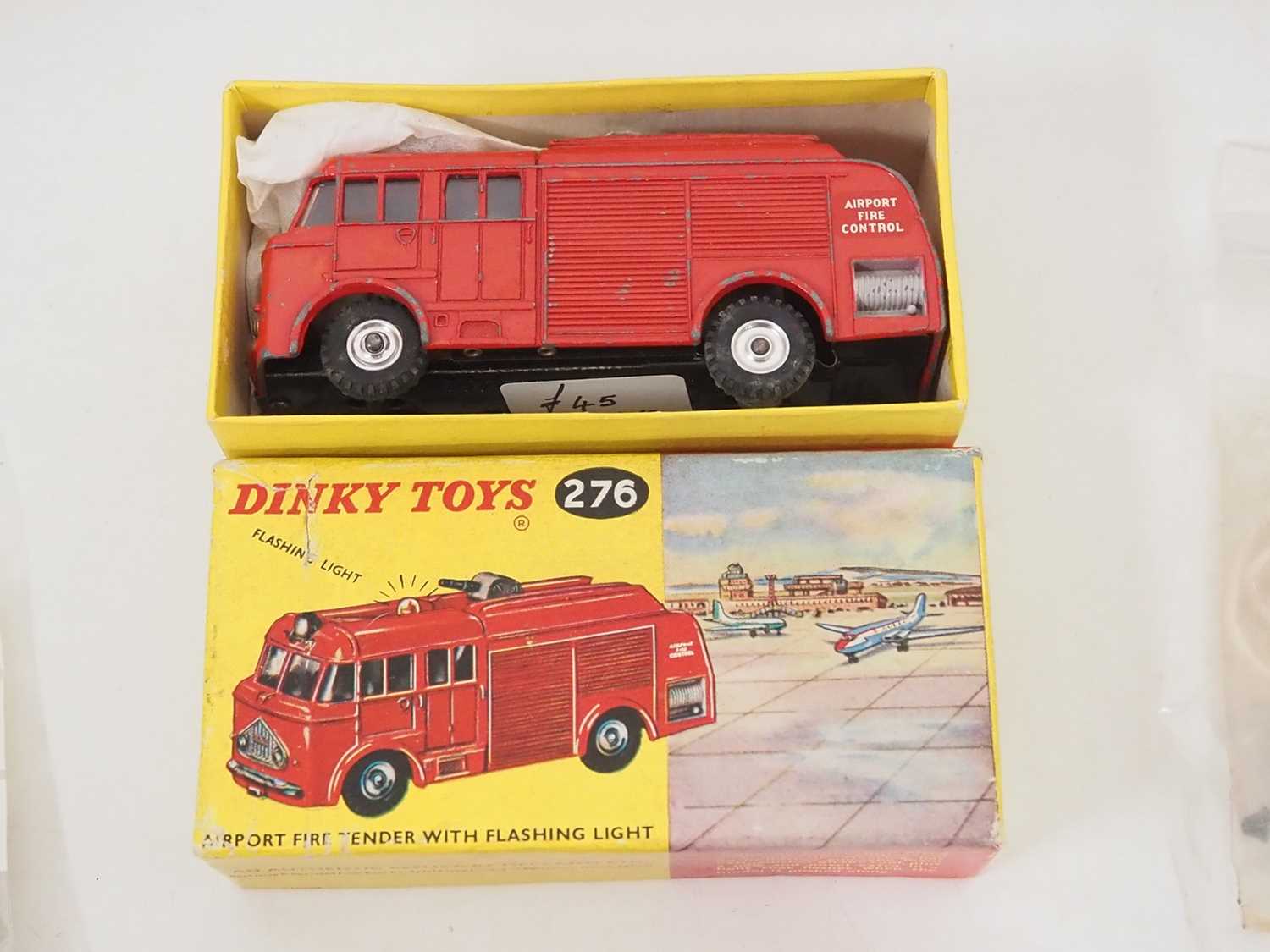 A group of boxed and unboxed DINKY fire engines together with two DINKY 008 fire brigade personnel - Image 2 of 3