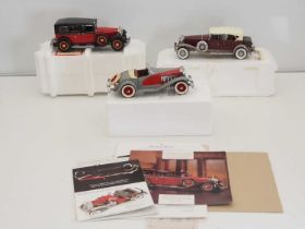 A group of three FRANKLIN MINT and DANBURY MINT 1:24 scale diecast vehicles comprising: Mercedes