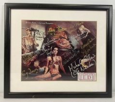 STAR WARS - A multi signed French promotional still of Princess Leia, captured by Jabba in STAR WARS