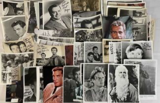 A collection of male movie star autographs on promotional 8 x 10" stills signed by CHARLTON HESTON