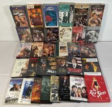 A collection of autographed Drama and Romance VHS tapes and DVDs including THE BEST YEARS OF OUR