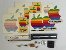 APPLE COMPUTERS - A collection of Apple collectibles and memorabilia including a 10kt gold plated