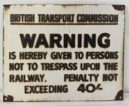 An enamel British Transport Commission trespass warning sign, 15" x 12"