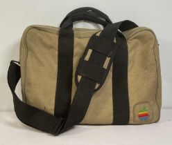 A vintage APPLE COMPUTERS shoulder bag in Khaki with rainbow logo, interior pockets, and padded