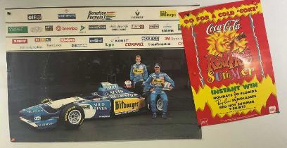 A pair of advertising posters, one for Formula 1 featuring MICHAEL SCHUMACHER, the other for Coca-