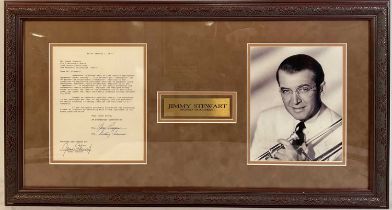 AUTOGRAPHS - A document signed by Actor JAMES STEWART in a presentation frame with a plaque and a