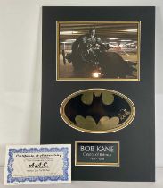 BATMAN - A colour print from THE DARK KNIGHT (2008) mounted in a BOB KANE, BATMAN themed cardboard