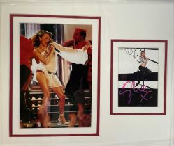 AUTOGRAPHS - A KYLIE MINOGUE signed display with live performance photograph, signed in pink pen,