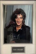AUTOGRAPHS - A framed and glazed photo on ROD STEWART, signed to bottom of image in silver pen