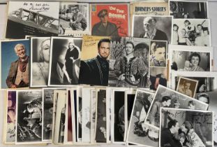 A collection of movie stars' autographs on promotional stills in black and white and colour