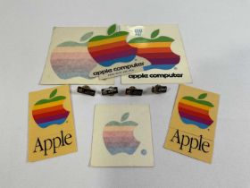 APPLE COMPUTERS - A group of Apple collectibles and memorabilia to include 4 rainbow Apple 'Lisa'