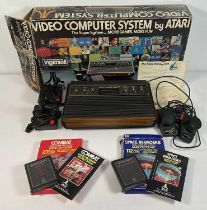 RETRO GAMING - An Atari CX-2600 video computer system, complete in original box with controllers and