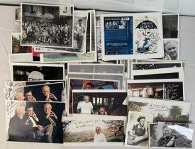 A collection of autographed promotional stills signed by producers, cinematographers and others