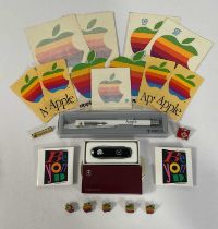 APPLE COMPUTERS - A group of Apple collectibles and memorabilia including a rainbow logo Parker pen,