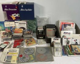 RETRO GAMING &/COMPUTING - A large collection of floppy disks, CDs and instruction manuals for games