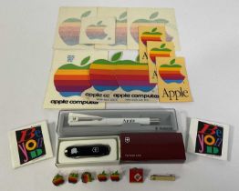 APPLE COMPUTERS - A selection of vintage Apple collectibles and memorabilia including a Victorinox